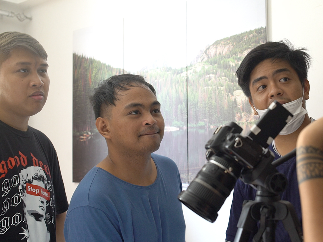 Producer Ivan Cabanial, Director Neo Bryce and DP JP Calis listening to someone talk