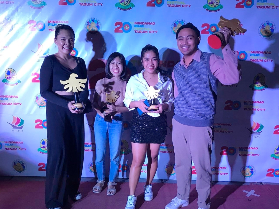 Anj Estrella, Karina Jabido, Gezelle Dacillo and Neo Bryce posing with Mindanao Film Festival trophies.