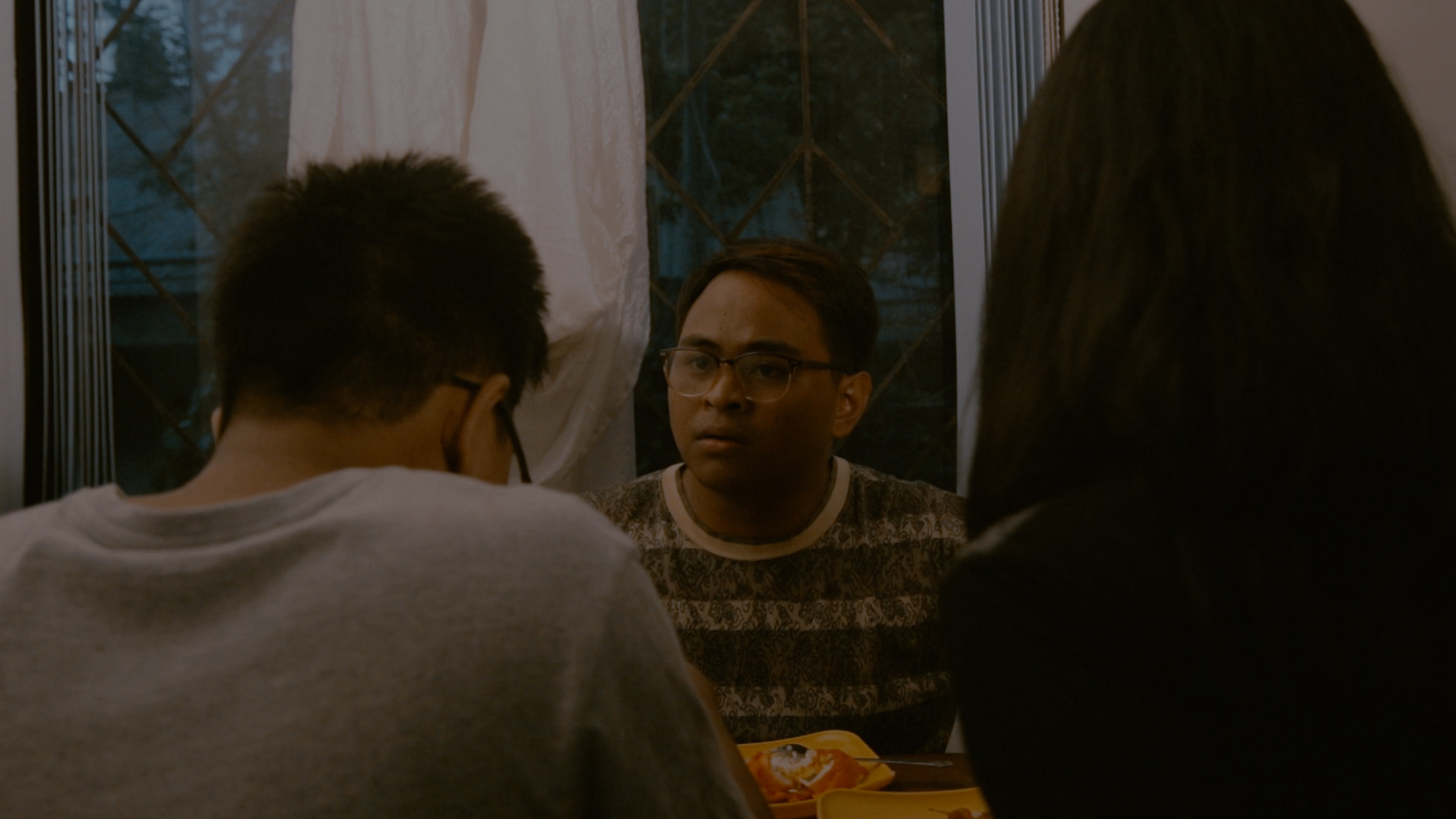 Guy sad with parents