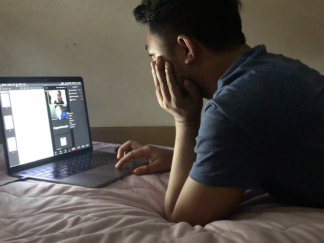 Ed Trumata in front of a laptop getting ready to shoot a scene via Zoom
